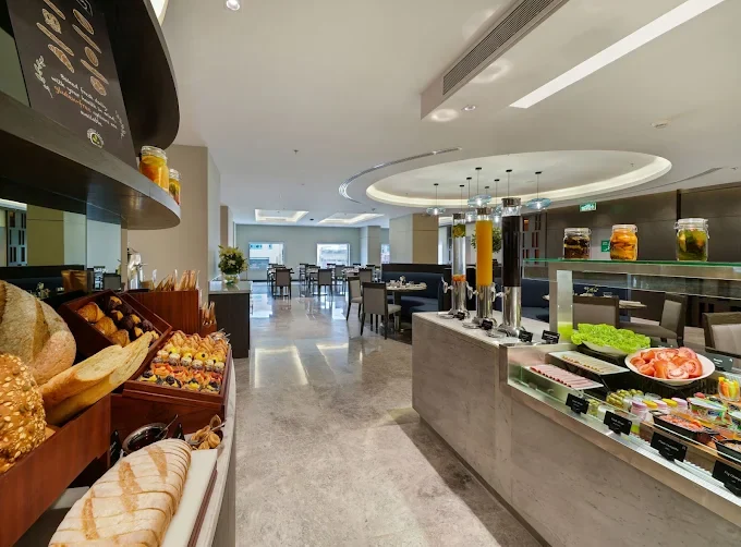 The hotel's restaurant, laid for breakfast